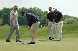 Picture of golfers at the Annual EyakTek Classic